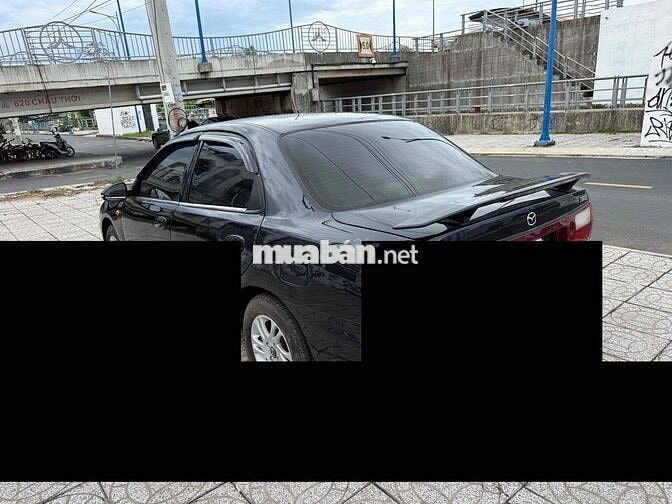 Mazda 323 2000 Đen