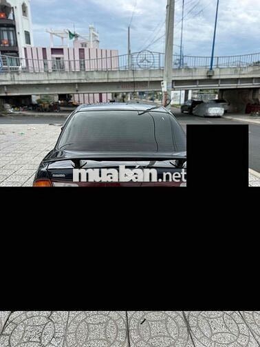 Mazda 323 2000 Đen