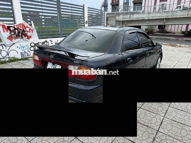 Mazda 323 2000 Đen