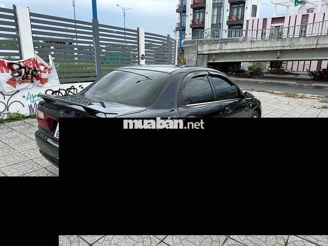 Mazda 323 2000 Đen