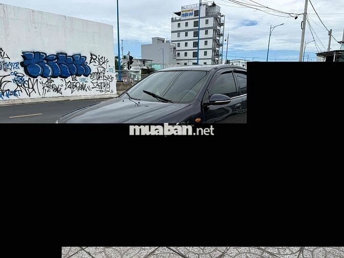 Mazda 323 2000 Đen
