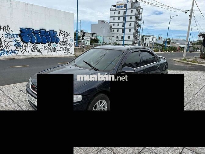 Mazda 323 2000 Đen