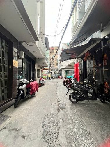 Nhà hẻm xe hơi 565 Nguyễn Trãi, P.An Đông-nhà 4 tầng ở liền