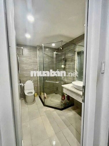 Nhà 1 Trệt 4 Lầu 5PN 6WC 4x20m Mặt Tiền Đường Số Phường Tân Quy