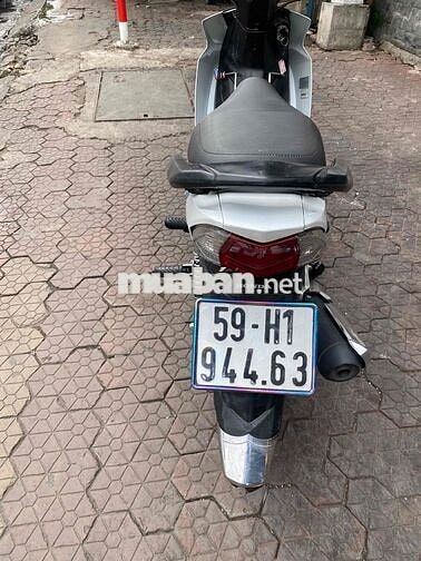 Honda Blade trắng xanh