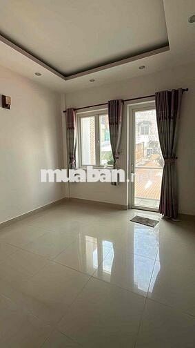 Nhà nc mới Đẹp tr 3 lầu sân thượng 5pn trường chinh p11 Q.tân bình.