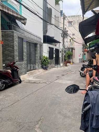 Nhà HXH dt22m2 đúc 5 tầng 3pn không lộ giới đường Âu Cơ P10,Q.Tân Bình