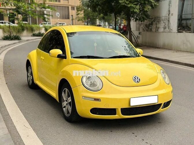 Volkswagen New Beetle 1.6 AT 2009 Vàng