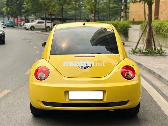 Volkswagen New Beetle 1.6 AT 2009 Vàng