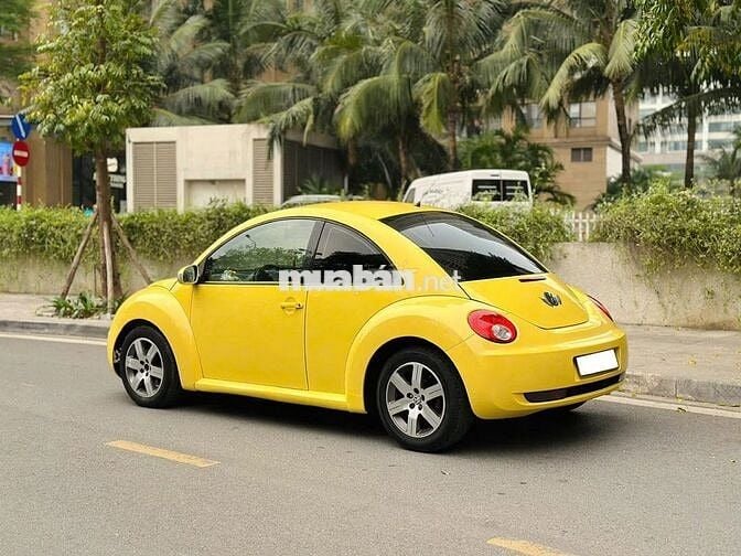 Volkswagen New Beetle 1.6 AT 2009 Vàng