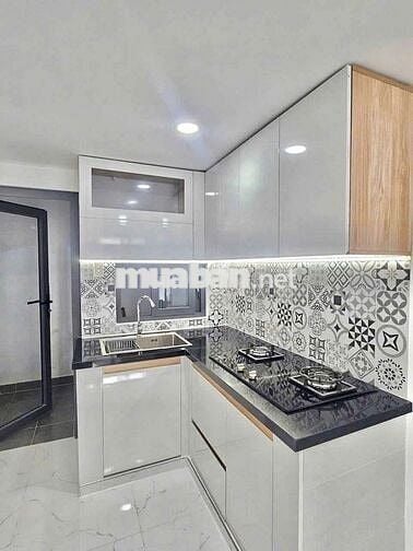 Nhà 1 Trệt 1 Lửng 4x12m Mặt Tiền Hẻm Xe Hơi 749 Huỳnh Tấn Phát