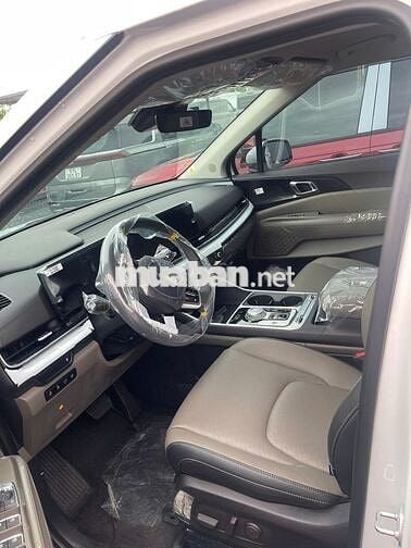 KIA CARNIVAL 1.6T HEV SIGNATURE Trắng 7 chỗ