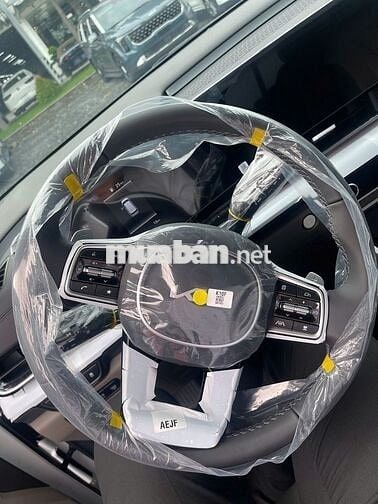 KIA CARNIVAL 1.6T HEV SIGNATURE Trắng 7 chỗ