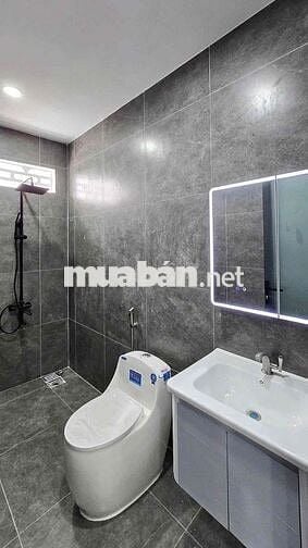 Hạ giá 200tr, cần bán nhanh nhà lầu mới xây gần KDL Bửu Long