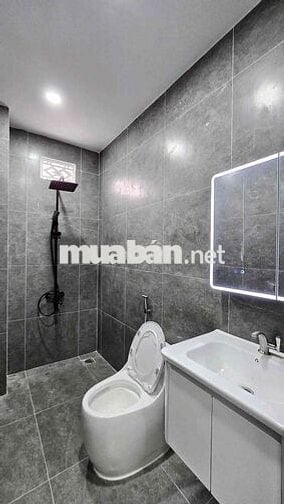 Hạ giá 200tr, cần bán nhanh nhà lầu mới xây gần KDL Bửu Long