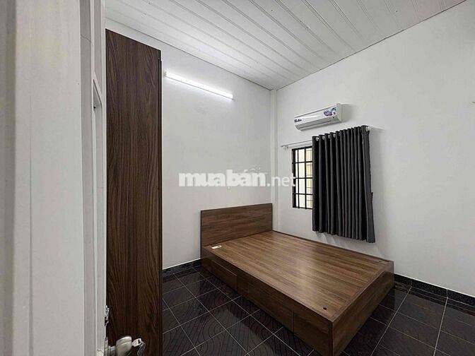 Cho thuê nhà hẻm thông xe hơi 1 trục Lê Văn Thọ DT 64 m trệt lầu giá 1
