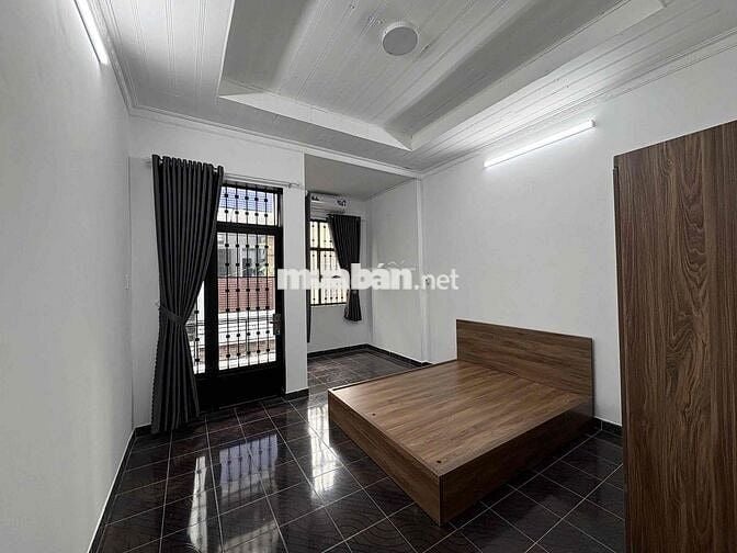 Cho thuê nhà hẻm thông xe hơi 1 trục Lê Văn Thọ DT 64 m trệt lầu giá 1