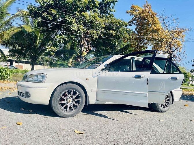 Ford Laser 1.8 MT Trắng Số sàn