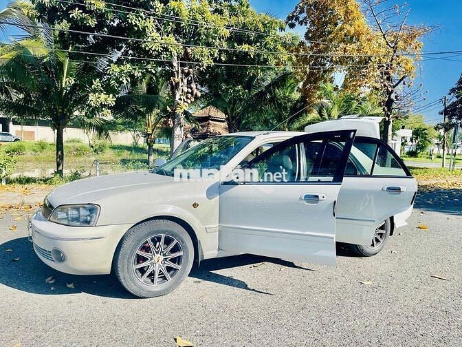Ford Laser 1.8 MT Trắng Số sàn