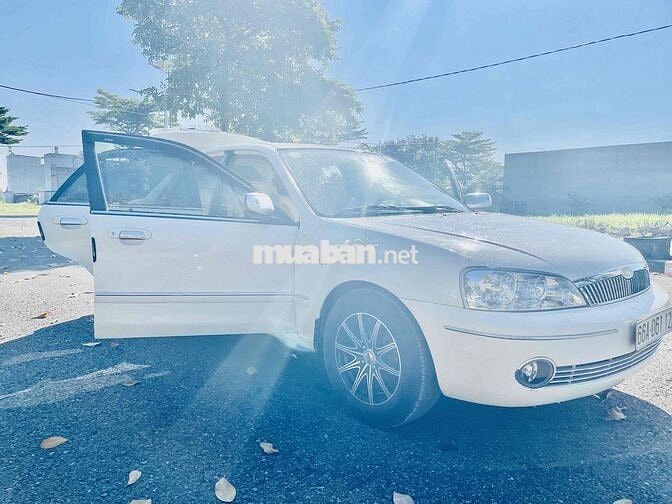 Ford Laser 1.8 MT Trắng Số sàn