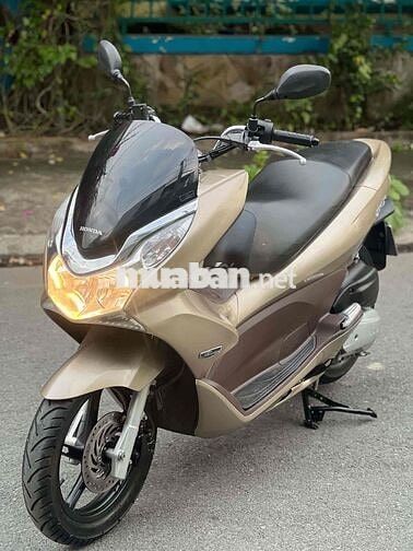 Honda PCX  2010 màu vàng nhạt nhấp mới 95 %