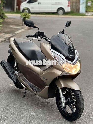 Honda PCX  2010 màu vàng nhạt nhấp mới 95 %