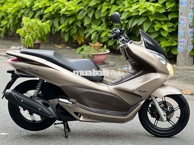 Honda PCX  2010 màu vàng nhạt nhấp mới 95 %
