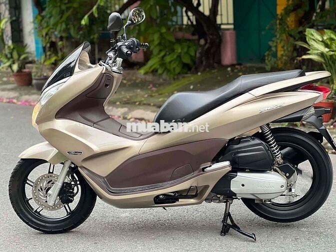 Honda PCX  2010 màu vàng nhạt nhấp mới 95 %