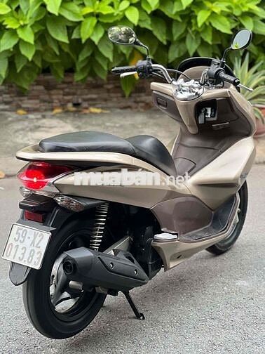 Honda PCX  2010 màu vàng nhạt nhấp mới 95 %