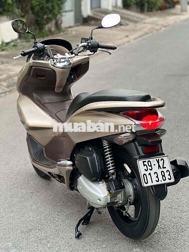 Honda PCX  2010 màu vàng nhạt nhấp mới 95 %