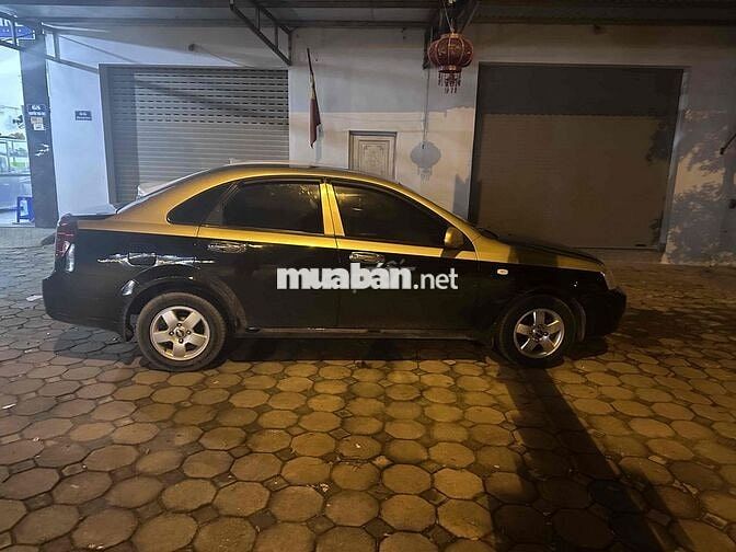 Chevrolet Lacetti Đen, vàng 5 chỗ