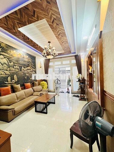 Cho thuê nhà hẻm xe hơi thông cách mt quang trung 50m