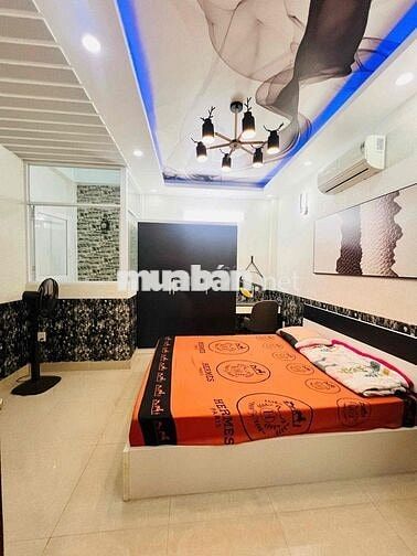 Cho thuê nhà hẻm xe hơi thông cách mt quang trung 50m