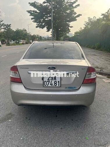 Ford Focus 2010 Ghi vàng 5 chỗ