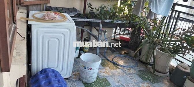 4x14 trệt lầu 2pn gần pmqtrung có máy giặt hẻm ô tô 