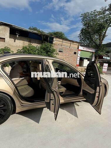 BMW 750Li xDrive F02 2009 Vàng cát Mỹ