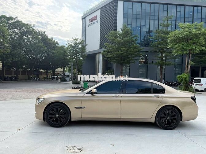 BMW 750Li xDrive F02 2009 Vàng cát Mỹ