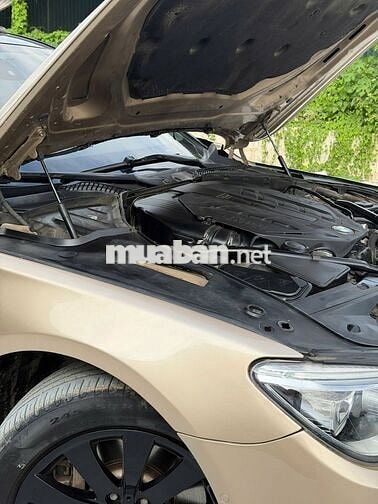 BMW 750Li xDrive F02 2009 Vàng cát Mỹ