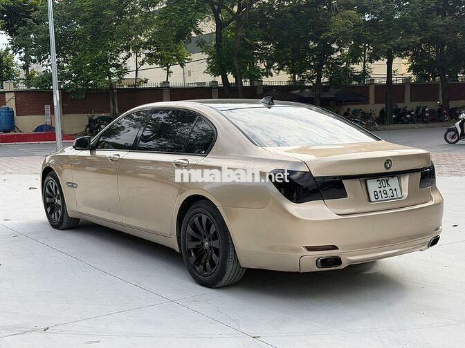 BMW 750Li xDrive F02 2009 Vàng cát Mỹ