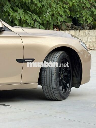 BMW 750Li xDrive F02 2009 Vàng cát Mỹ