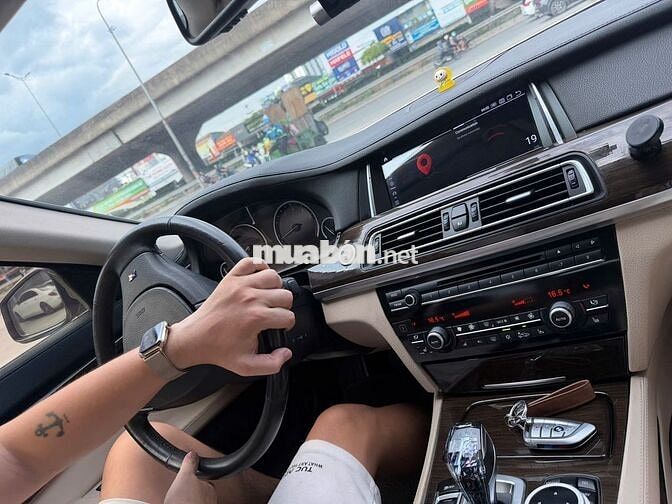 BMW 750Li xDrive F02 2009 Vàng cát Mỹ
