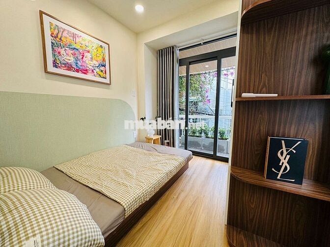 Siêu phẩm Nhà 2 tầng - Hẻm Xe hơi - Gần Vincom Quang Trung 22M2 