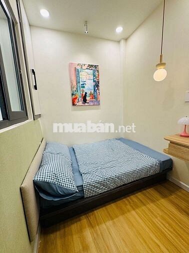 Siêu phẩm Nhà 2 tầng - Hẻm Xe hơi - Gần Vincom Quang Trung 22M2 