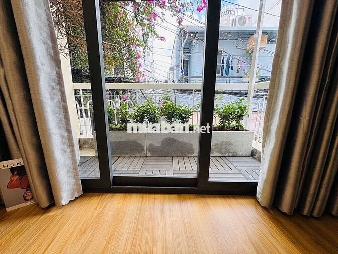 Siêu phẩm Nhà 2 tầng - Hẻm Xe hơi - Gần Vincom Quang Trung 22M2 