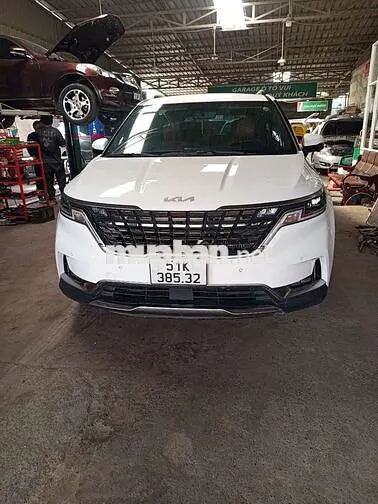 Kia Carnival Premium 2022 Trắng 7 chỗ Dầu 445000km