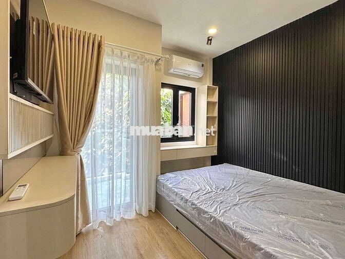 Cho thuê căn hộ Studio ban công 35m2, Full nt, máy giặt riêng, Quận 1