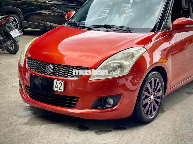 Suzuki Swift 2015 Tự động 130.000 km Đỏ