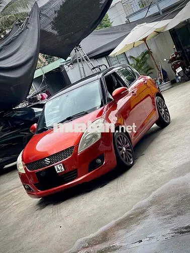 Suzuki Swift 2015 Tự động 130.000 km Đỏ
