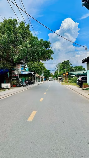 Cần bán gấp lô đất thổ cư Dt 100m2 sổ hồng riêng. Maặt tiền đường nhựa