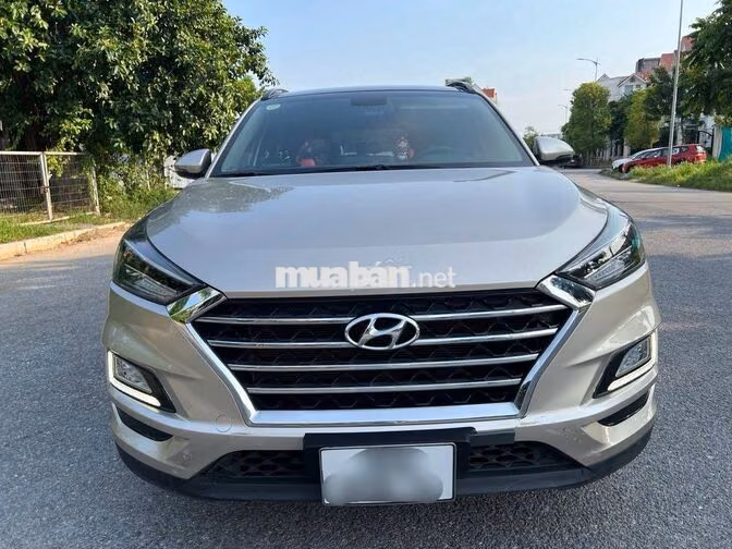 Hyundai Tucson 2.0 ATH 2021 Vàng sâm panh 27000 km